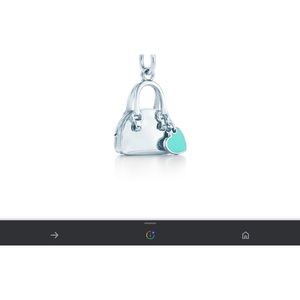 Tiffany’s purse charm-new with tags.  Out of stock at store